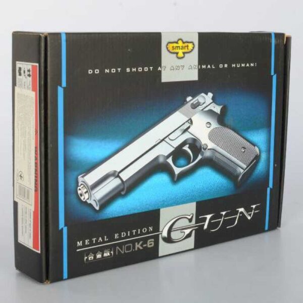 Игрушечный металлический пистолет "Gun K-6" на пульках в коробке.