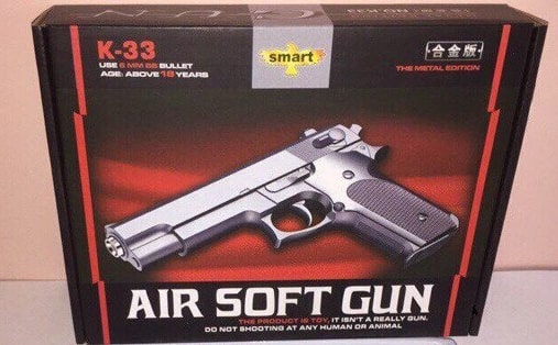 Игрушечный металлический пистолет "Air Soft Gun K-33" на пульках в коробке. 1