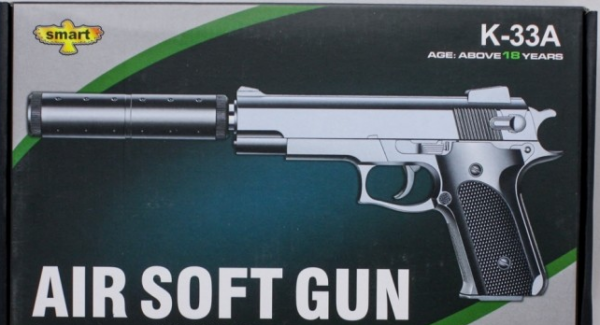 Игрушечный металлический пистолет "К-33А" на пульках в коробке.