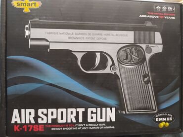 Игрушечный металлический пистолет "Air Sport Gun K-17SE" на пульках в коробке.