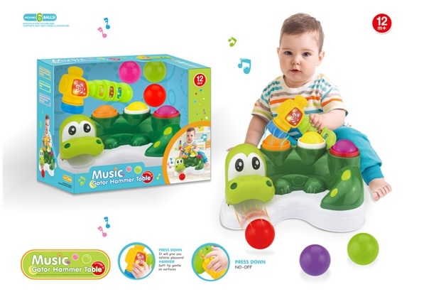 Развивающая игрушка "Крокодил с молоточком" (свет, звук) в коробке. 1